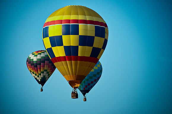 Three Floating Balloons